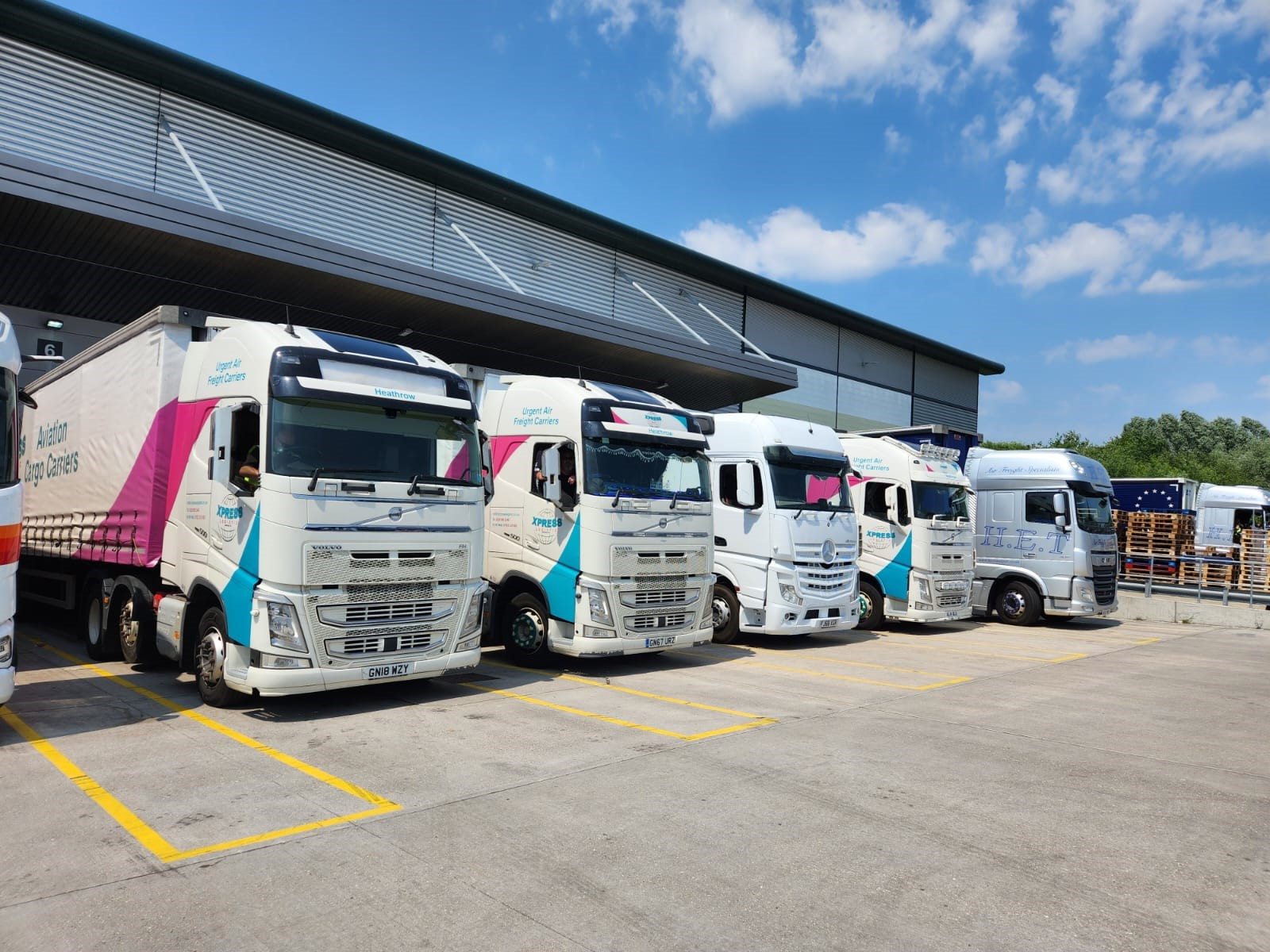 Xpress fleet lined up at a logistics facility